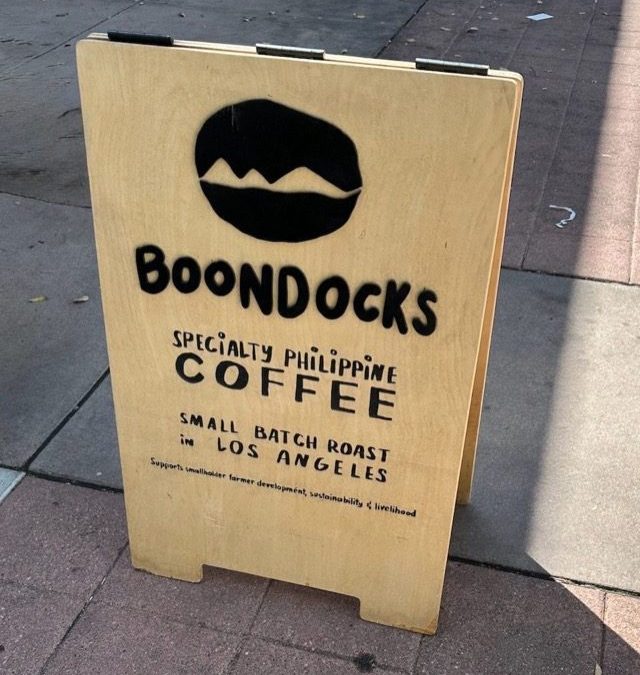Boondocks Specialty Philippine Coffee A standing sign outside.